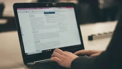 can you make $100 a day with affiliate marketing? 10 person typing on laptop computer